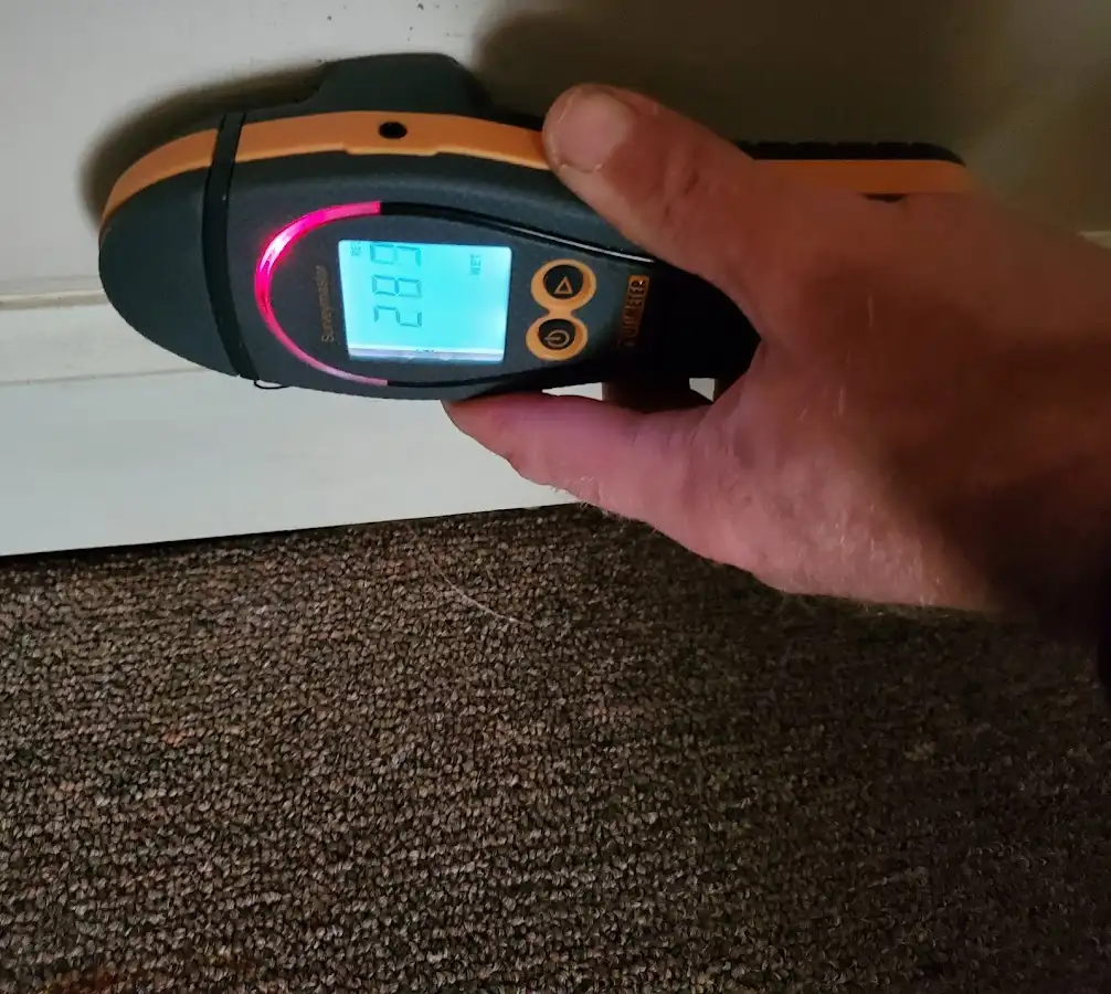 Moisture detection at baseboard during Burst Pipe Cleanup in Independence